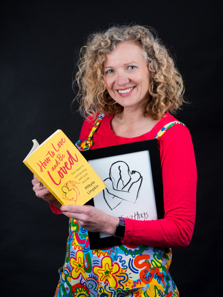 Mikyla Limpkin holding How to Love and Be Loved